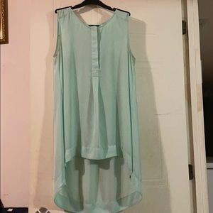 Long sleeveless blouse